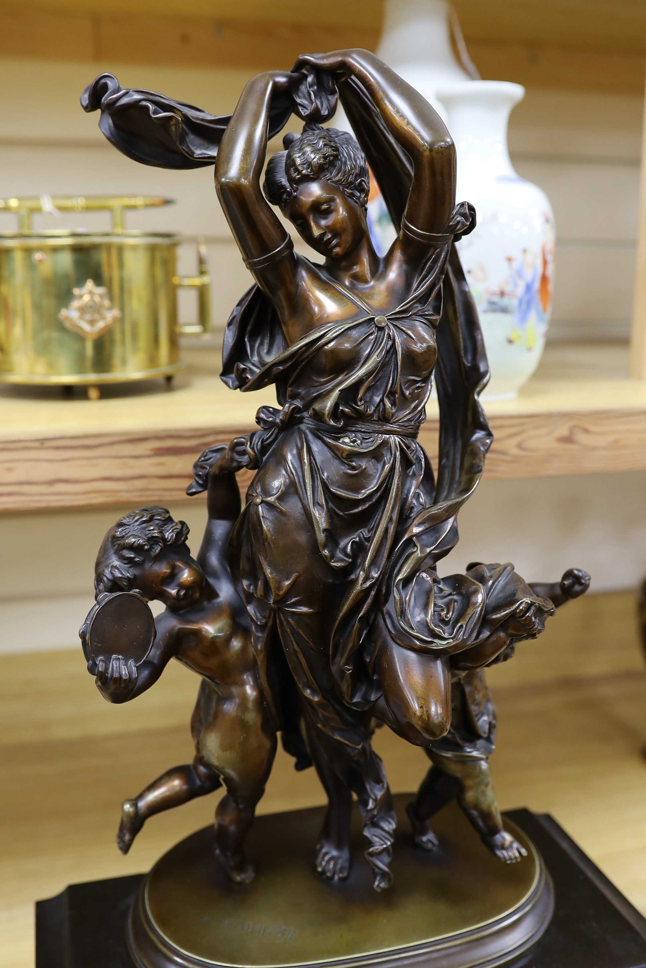 A late 19th century French bronze figural mantel clock, A. Carrier, 66cm